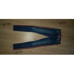 Retour jeans met rood wit zwarte band mt 14