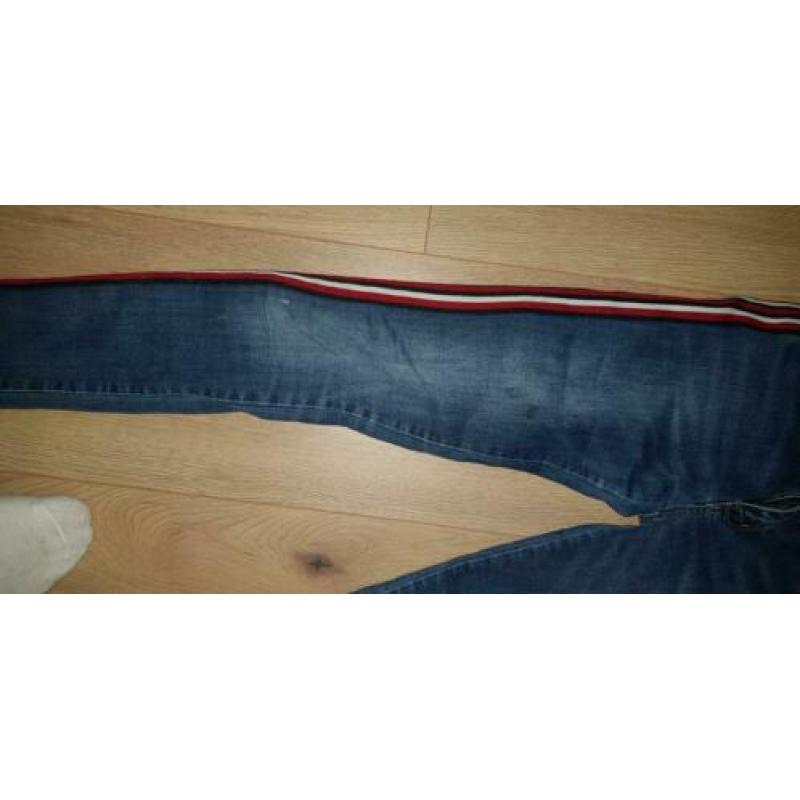 Retour jeans met rood wit zwarte band mt 14