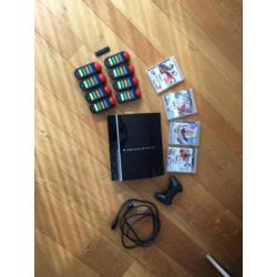 PlayStation 3 met spellen en controllers