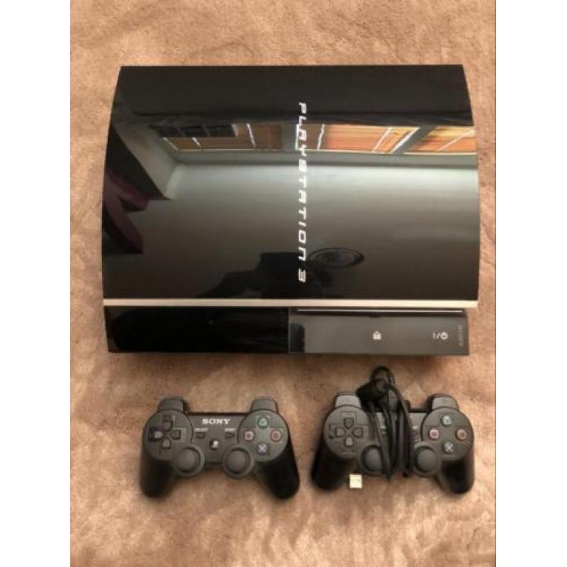 PlayStation 3 80GB met 2 controllers en 8 spellen