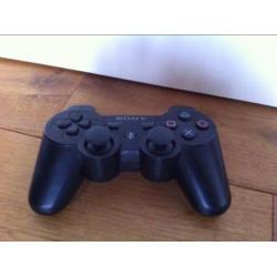 Sony PlayStation 3 met 18 spelletjes en 2 microfoons