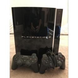 PlayStation 3 80GB met 2 controllers en 8 spellen